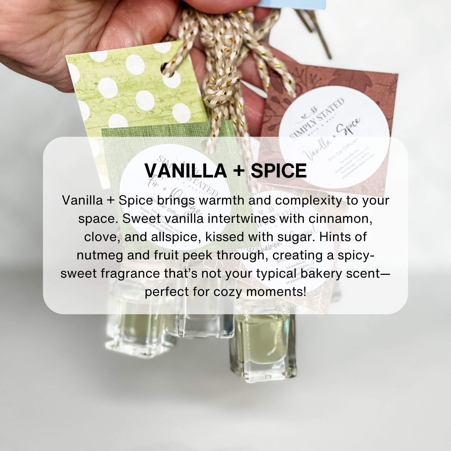 Simply Stated Vanilla Spice car diffuser bottles held in hand with scent description text and gift tags.