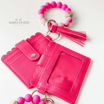Card Wallet in Hot Pink. Includes silicone beaded bracelet keychain and tassle (hot pink)