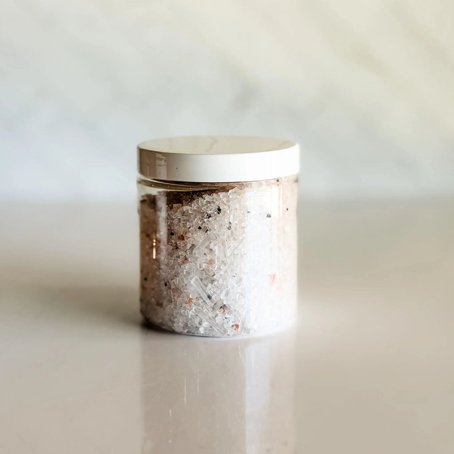 Simply Stated Cool Feet Pedi Soak mineral foot soak showing magnesium sulfate Himalayan sea salt and activated charcoal crystals — mentholated foot soak handcrafted in Colorado