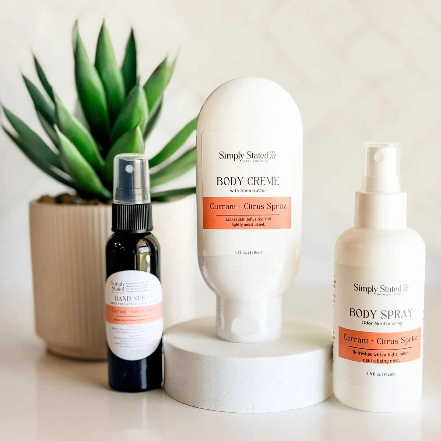 Simply Stated On the Go Bundle in Currant and Citrus Spritz — shea butter body creme, odor-neutralizing body spray, and exclusive hand spray, 2026 anniversary scent