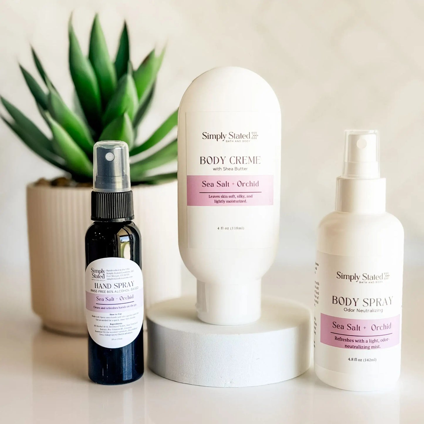 Simply Stated On the Go Bundle in Sea Salt and Orchid — shea butter body creme, odor-neutralizing body spray, and exclusive hand spray, handcrafted in Fort Morgan Colorado