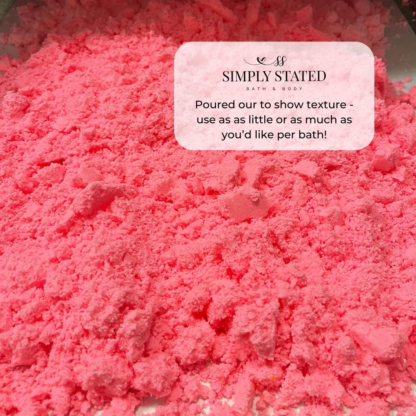 Pink crushed bath bomb powder showing texture of Jasmine Bergamot Bath Bomb in a Jar for customizable bath use.
