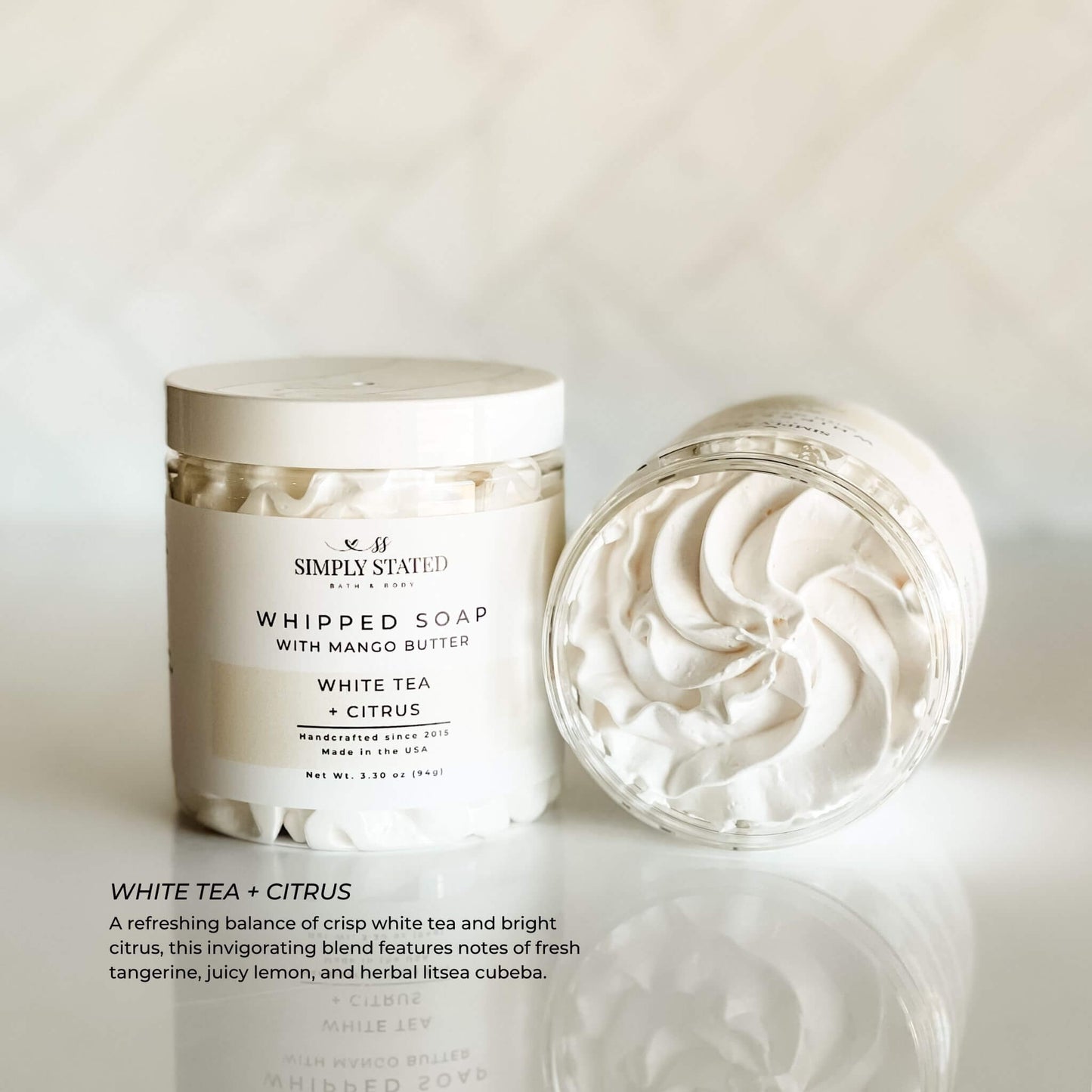 White Tea + Citrus Whipped Soap by Simply Stated – creamy white swirl with bright citrus and herbal notes, housed in a 3.3 oz summer collection jar.