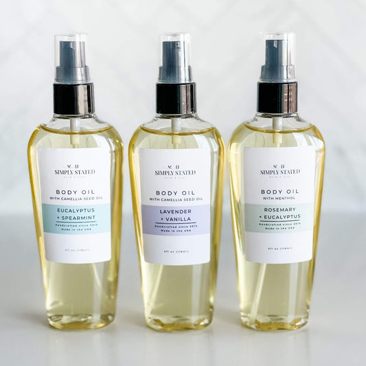 Simply Stated Bath & Body Aromatherapy Body Oils featuring Eucalyptus + Spearmint, Lavender + Vanilla, and Rosemary + Eucalyptus. Hydrating oils blended with essential oils for relaxation, relief, and rejuvenation in 4oz bottles.