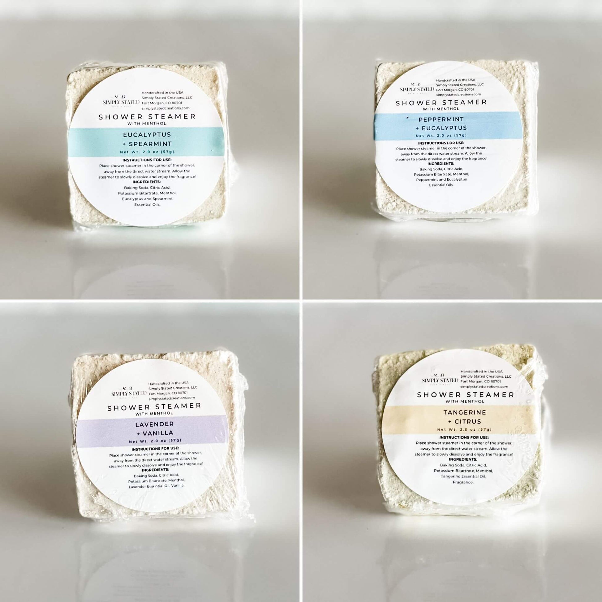 Simply Stated Bath & Body assorted mentholated shower steamers featuring Eucalyptus + Spearmint, Lavender + Vanilla, Peppermint + Eucalyptus, and Tangerine + Citrus. Handmade with essential oils for an invigorating and relaxing aromatherapy experience in the shower.