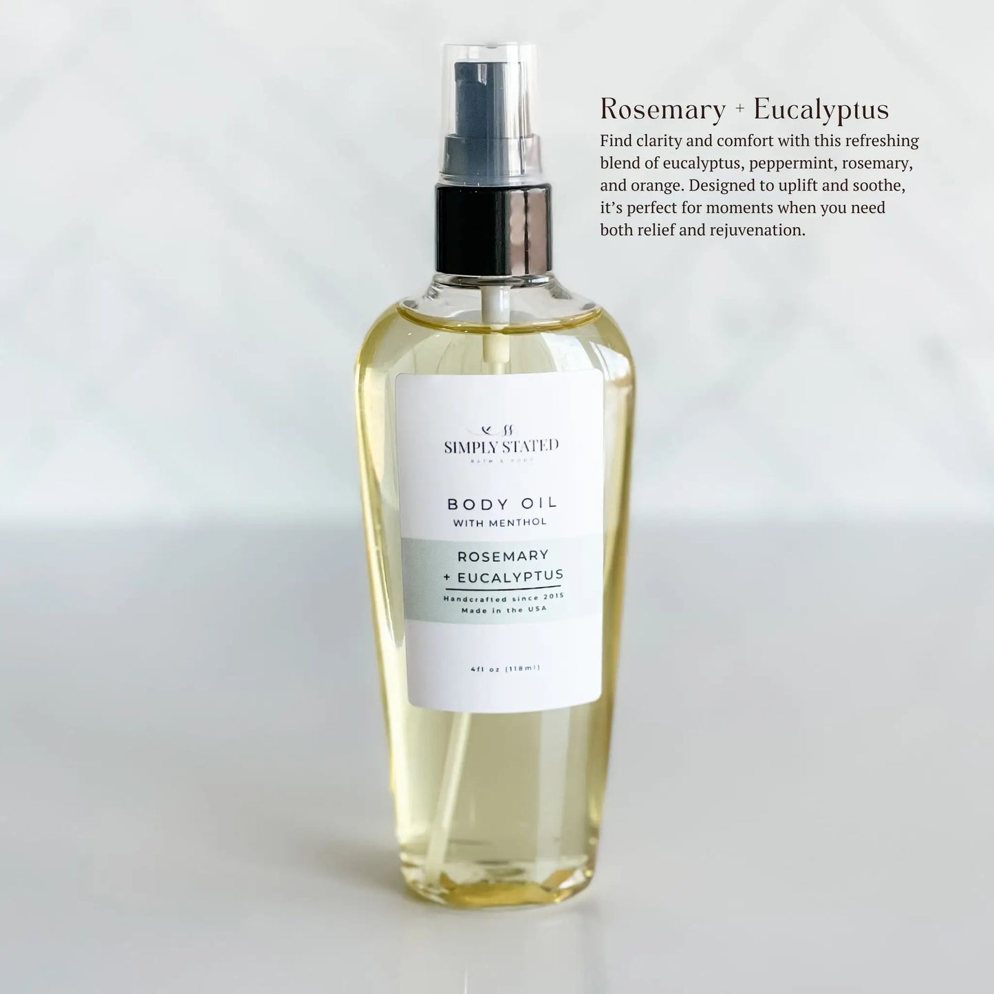 Body oil bottle with a label on a white background. Rosemary Eucalyputs is made with menthol. Find clarity and comfort with this refreshing blend of eucalyptus, peppermint, rosemary, and orange. Designed to uplift and soothe, it’s perfect for moments when you need both relief and rejuvenation.