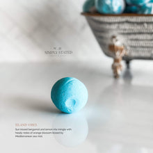 Sun-Kissed Collection Bath Bombs in Island Vibes: Sun kissed bergamot and lemon mix mingle with heady notes of orange blossom kissed by Mediterranean sea mist.