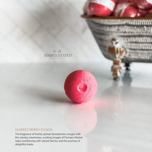 Farmers Market Collection Bath Bombs in Market Berry Fusion: The fragrance of freshly picked strawberries merges with the velvety creaminess, evoking images of Farmers Market stalls overflowing with vibrant berries and the promise of delightful treats.