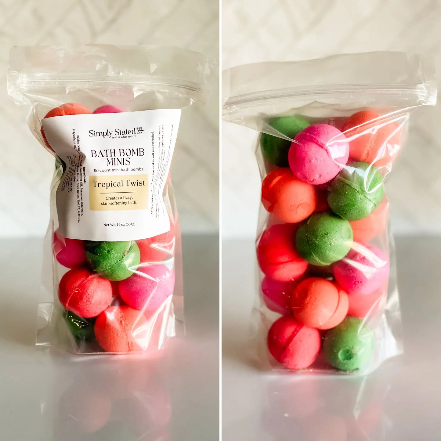 Packaged bath bomb minis with a 'Simply Stated' label on a white background scented in Tropical Twist