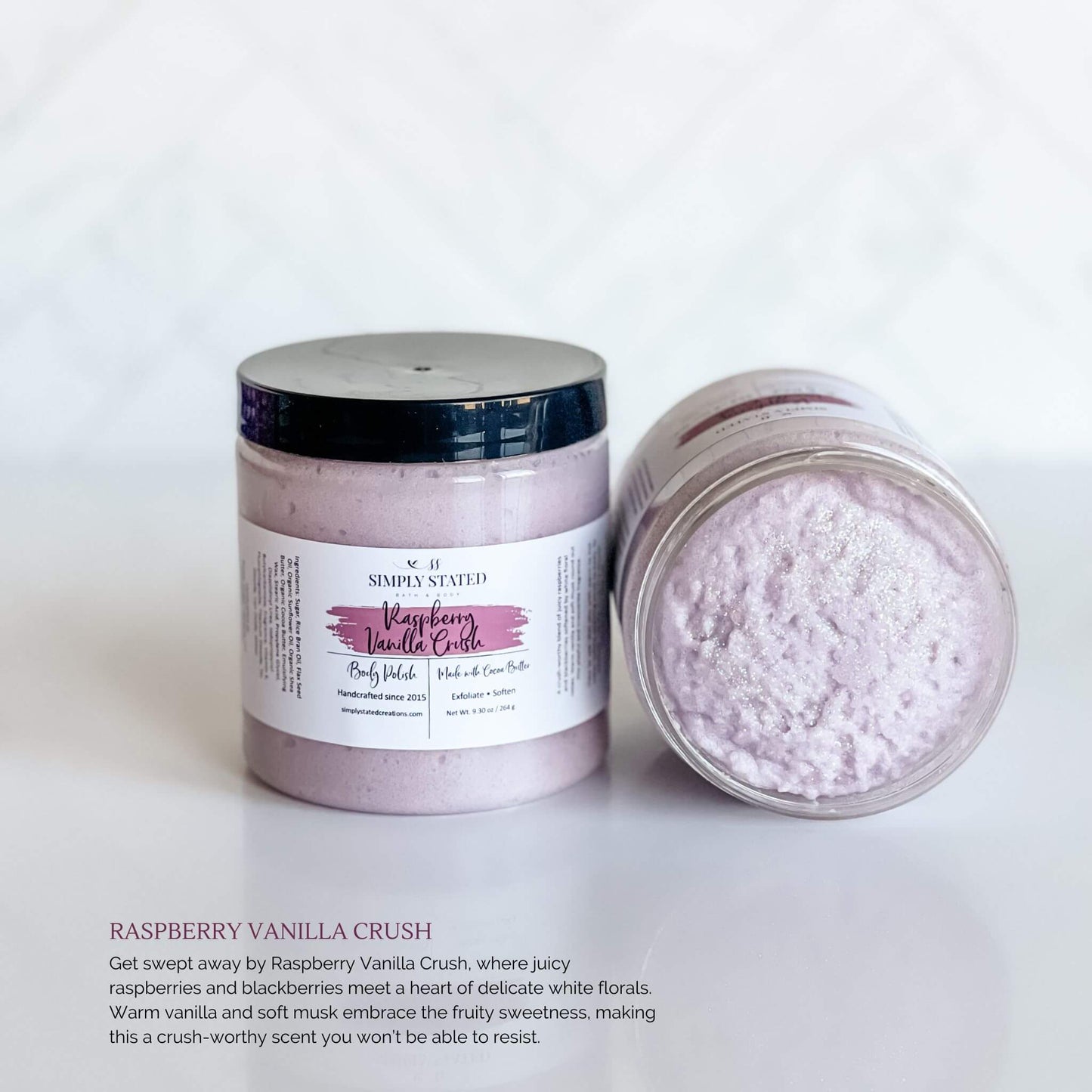 Simply Stated Bath & Body Raspberry Vanilla Crush Body Polish in a jar with light purple whipped exfoliating scrub, featuring a purple label and black lid, displayed on a white background.