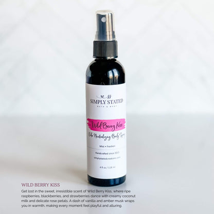 Simply Stated Bath & Body Wild Berry Kiss Odor Neutralizing Body Spray in a black spray bottle with a magenta label, displayed on a crisp white background.