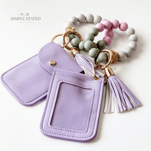 Card Case in Lavender. Includes silicone beaded bracelet keychain (lavender, grey, white marble) and matching lavender tassle