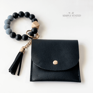 Card Case in Black. Includes silicone beaded keychain (black and grey) and tassle