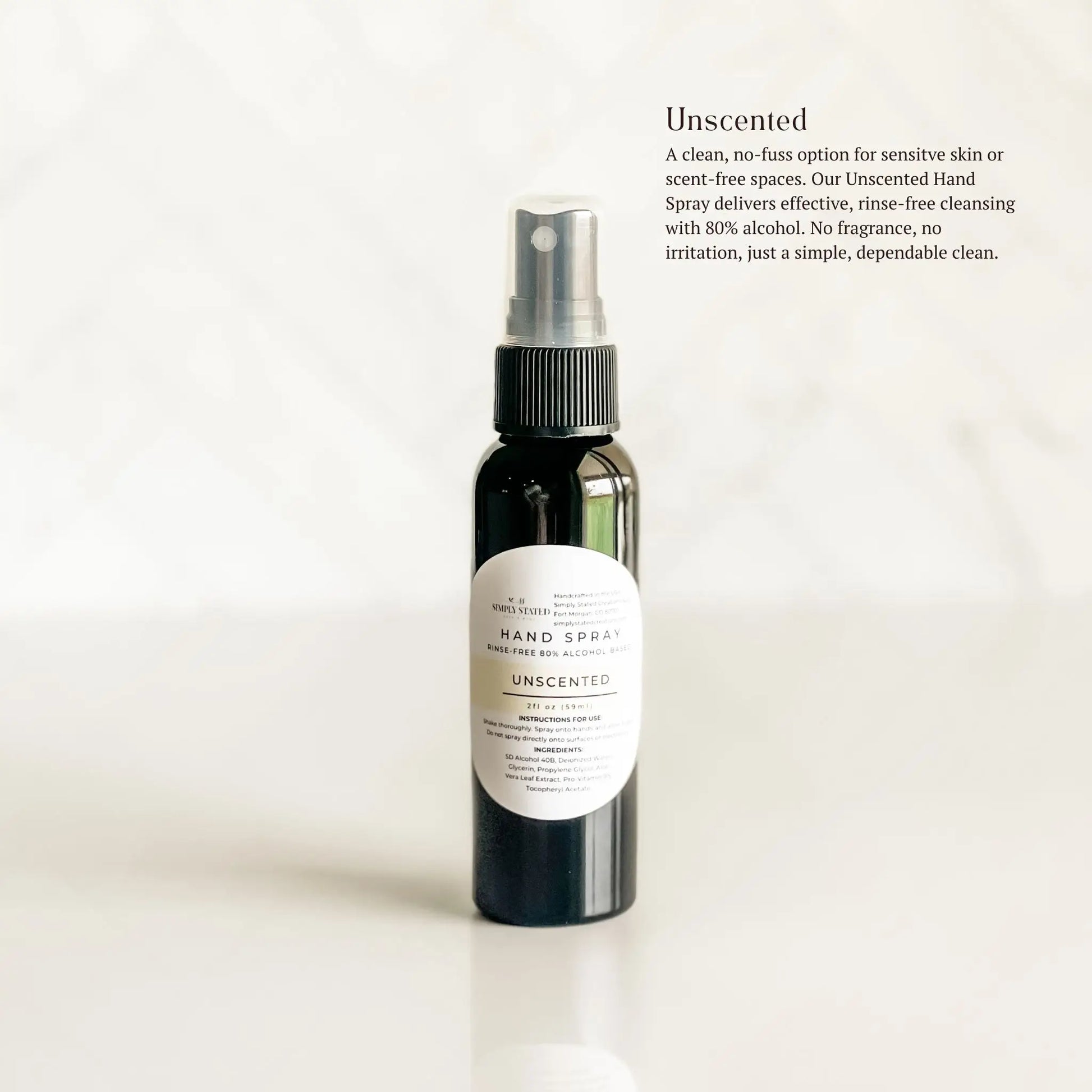 Unscented hand spray bottle on a white background with product description text.