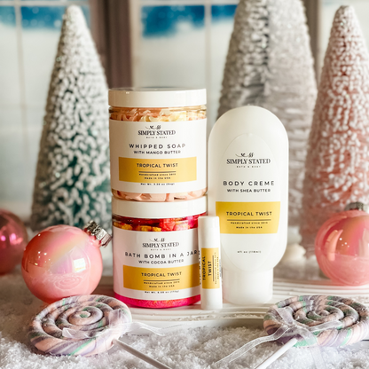 Simply Stated tropical twist whipped soap, bath bomb jar, body creme and lip balm with pastel trees and ornaments