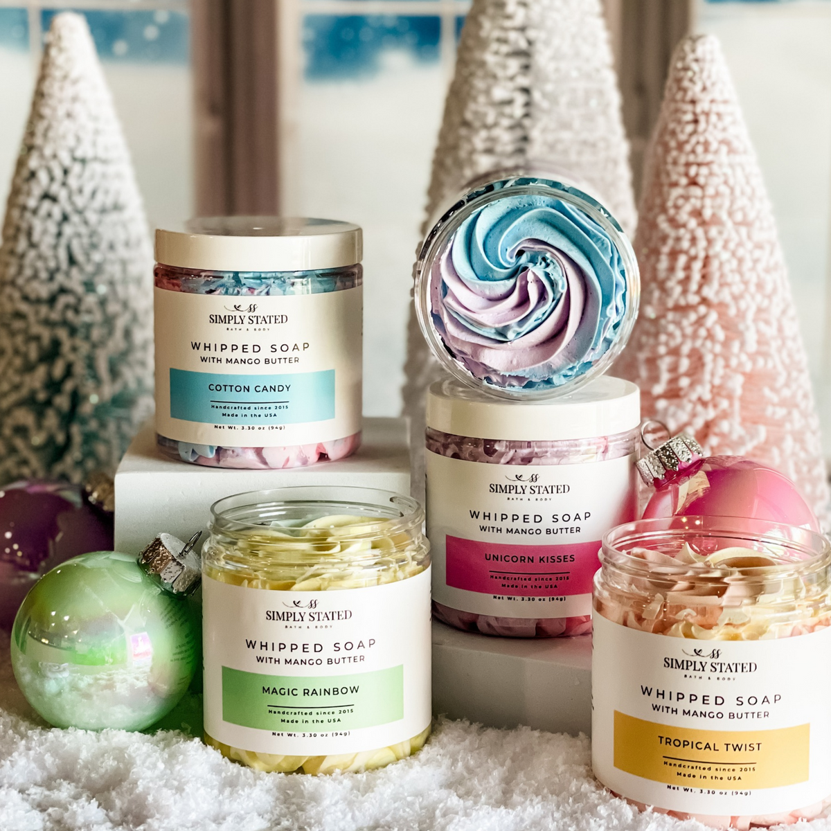Whipped soap with mango butter in cotton candy, unicorn kisses, magic rainbow and tropical twist by Simply Stated