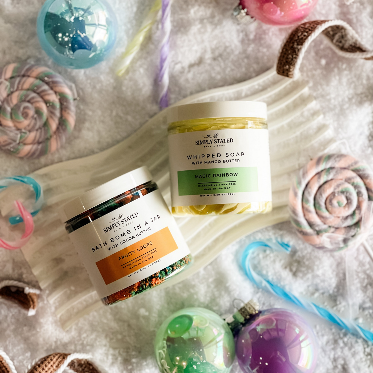 Simply Stated fruity loops bath bomb in a jar and magic rainbow whipped soap with candy canes and ornaments