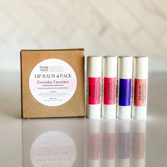 Lip balm 4-pack with a cardboard box labeled 'Everyday Favorites' on a light background