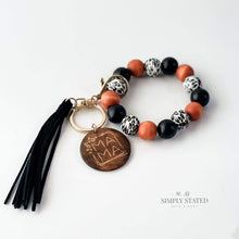 Bangle Keychain made with wood beads in natural wood, solid black, and leopard print. Mama wooden charm included. 