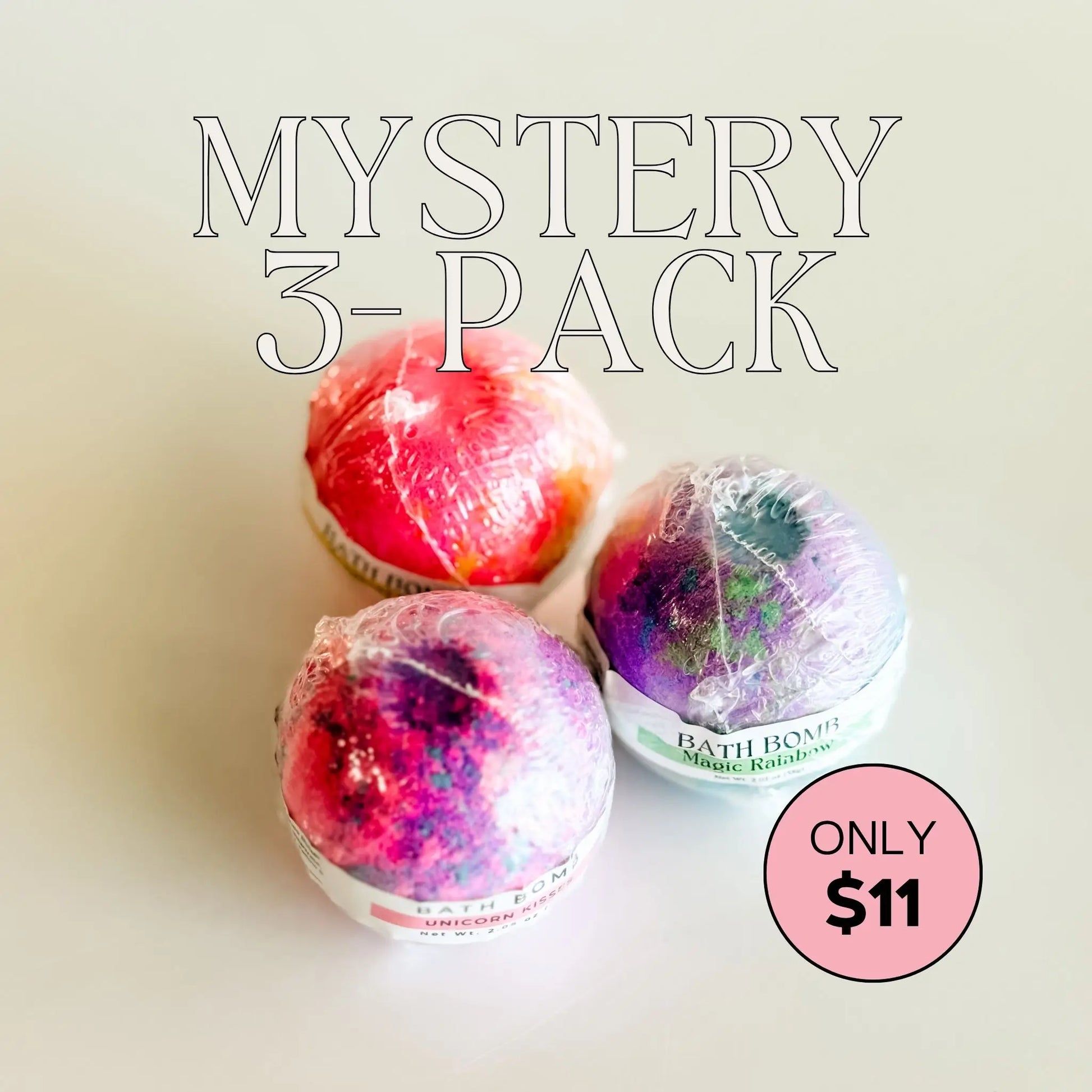 Three colorful bath bombs on a light background