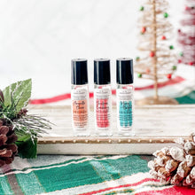 2023 Christmas Collection Roll-On Perfume in new limited edition scents like Amaretto Cheer, Christmas Cranberry, and Merry & Bright