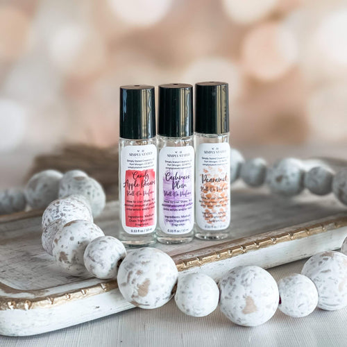 Winter Luxe Roll-On Perfume: Light Fragrance, Lasting Elegance including Candy Apple Dreams, Cashmere Plum, and Pearamel.