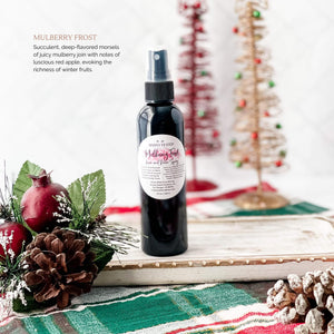 2023 Christmas Collection Odor Neutralizing Room Linen Car Spray in Mulberry Frost. Succulent, deep-flavored morsels of juicy mulberry join with notes of luscious red apple, evoking the richness of winter fruits.