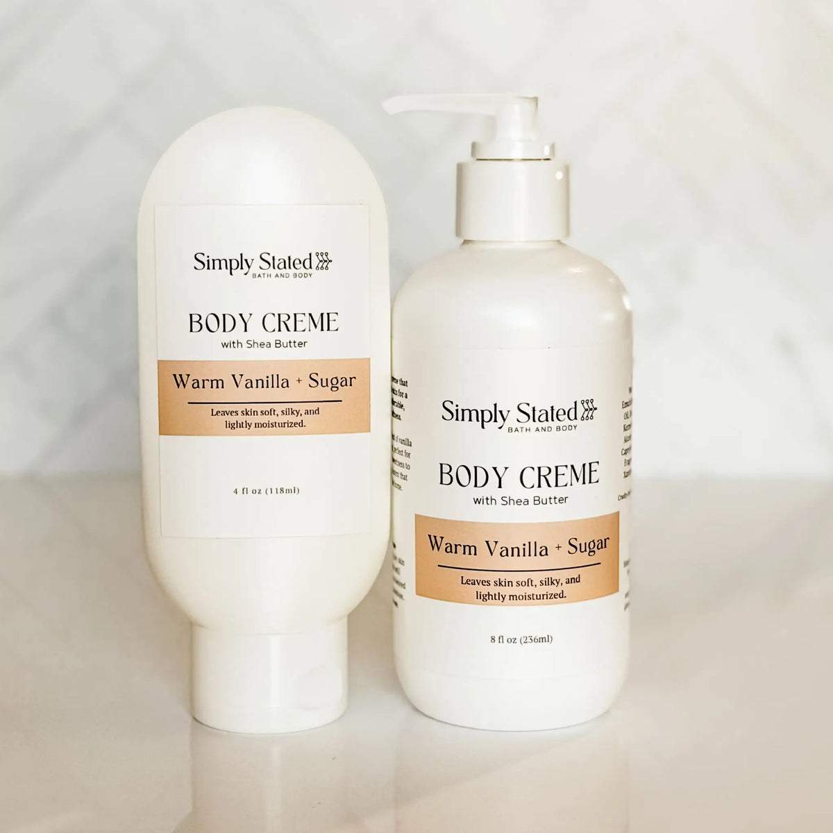 Warm Vanilla + Sugar Body Creme with Shea Butter by Simply Stated Bath & Body, tube and pump bottle side by side