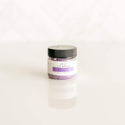 Simply Stated Bath & Body lip scrub in Black Cherry, displayed in a purple shade, perfect for softening lips with a fruity scent.