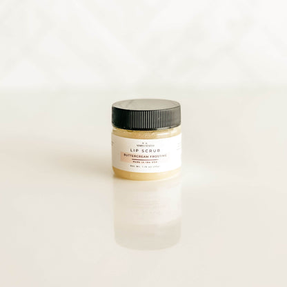 Buttercream Frosting lip scrub by Simply Stated Bath & Body, shown in a soft cream shade, with rich, dessert-inspired exfoliating sugar crystals.