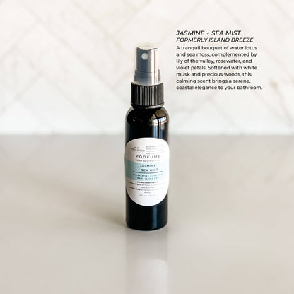 Bottle of Jasmine & Sea Mist poofume bathroom spray on a white background with product description text.