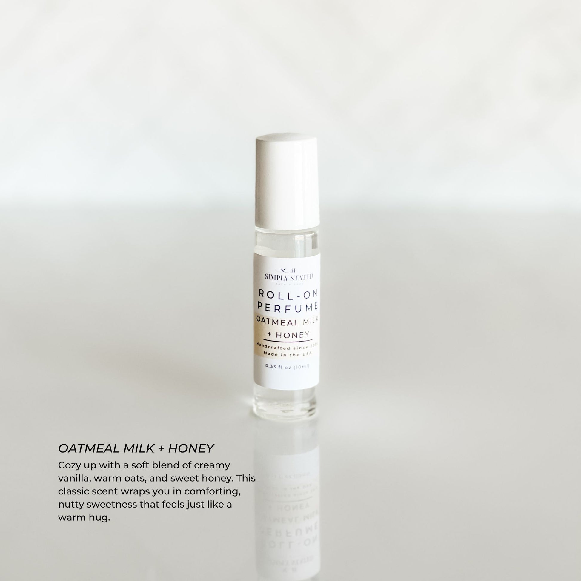 Simply Stated Signature Roll-On Perfume in Oatmeal Milk + Honey scent. A warm, comforting fragrance with creamy vanilla, sweet honey, and nutty oats.