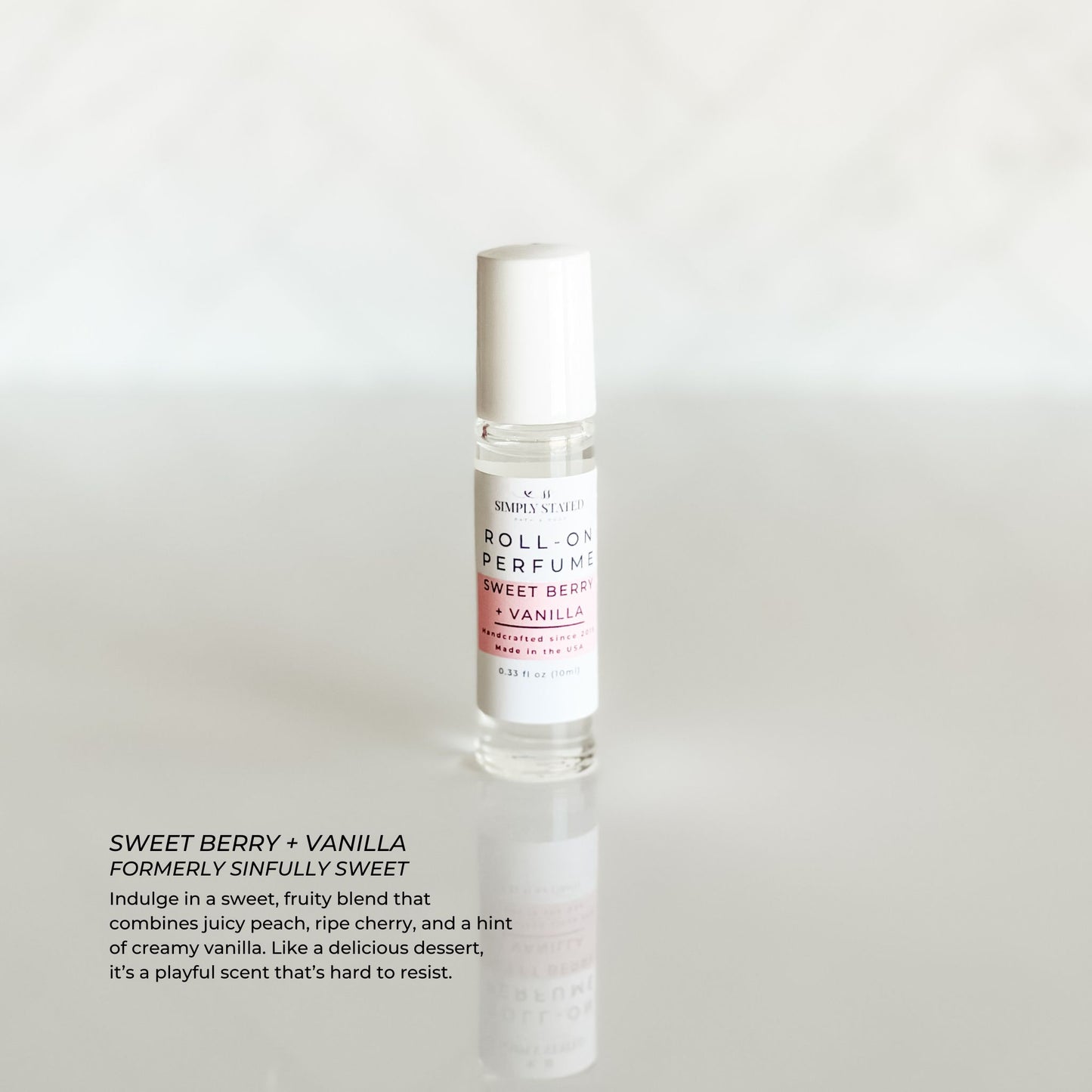 Simply Stated Signature Roll-On Perfume in Sweet Berry + Vanilla scent. A fruity, sweet aroma with notes of ripe cherry, juicy peach, and creamy vanilla.