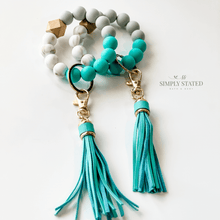 Bangle Keychain made with silicone beads in colors mint, grey, and white marble. Tassle included