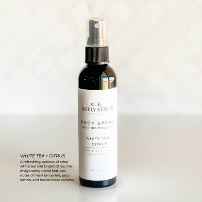 Simply Stated White Tea + Citrus Body Spray in a modern 4 oz bottle, featuring an uplifting blend of tangerine, lemon, and herbal white tea.