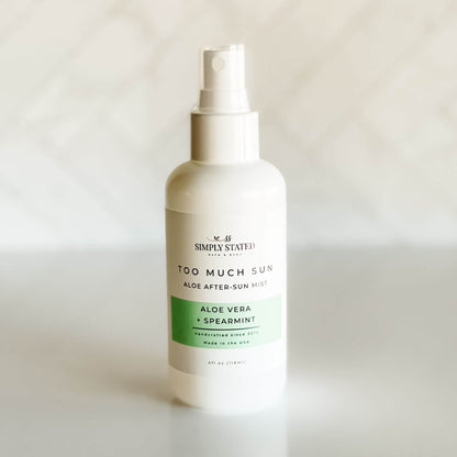 Too Much Sun aloe after-sun mist with natural aloe and essential oils, perfect for soothing sunburned skin.
