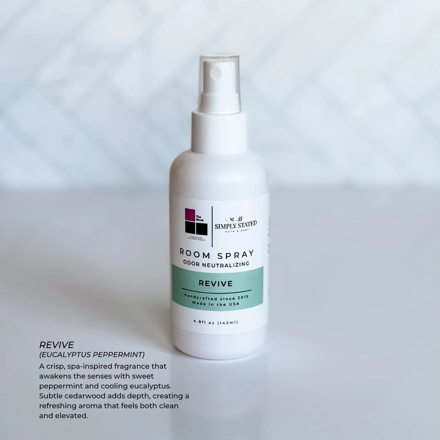 The Block x Simply Stated Room Spray in fragrance Revive with a clean minimalist background.