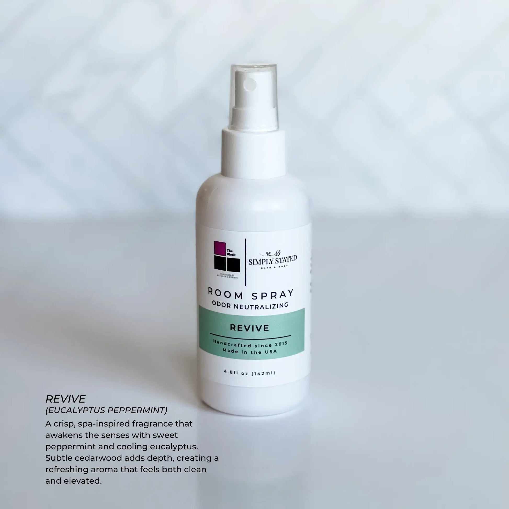 The Block x Simply Stated Room Spray in fragrance Revive with a clean minimalist background.