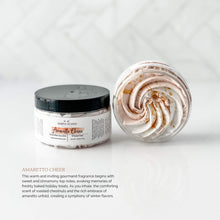 2023 Christmas Collection Whipped Soap in Amaretto Cheer (color tan swirled with white, gold mica sprinked on top). This warm and inviting gourmand fragrance begins with sweet and cinnamony top notes, evoking memories of freshly baked holiday treats. As you inhale, the comforting scent of roasted chestnuts and the rich embrace of amaretto unfold, creating a symphony of winter flavors.