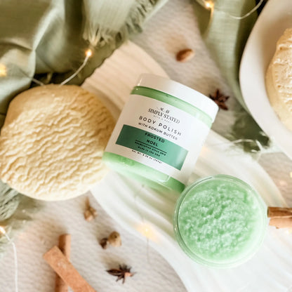 Simply Stated Frosted Noel Body Polish with kokum butter, green sugar scrub styled with cinnamon and star anise.