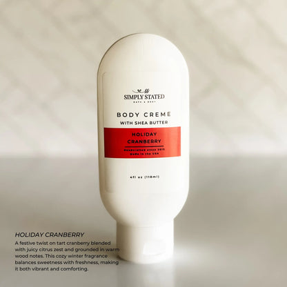 Simply Stated Holiday Cranberry Body Creme with shea butter, tart cranberry citrus scent, on marble background.