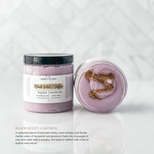 Black Violet Saffron handcrafted Body Polish Sugar Scrub. Purple color with copper sparkle mica. Fragrance description "a seductive blend of aromatic herbs, warm amber, and florals. Gentle notes of bergamot and geranium fade into a bouquet of rose and violet."