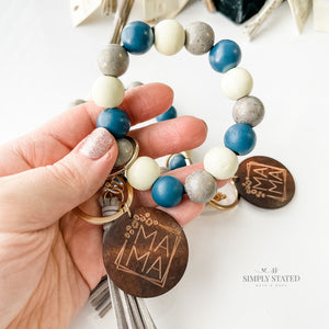 Bangle Keychain with wood beads in blue, silver, and cream. Mama wood charm included.