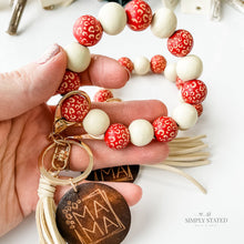 Bangle Keychain made with wood beads in red leopard and solid cream. Mama wooden charm included.